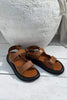 Leather sandals with buckles