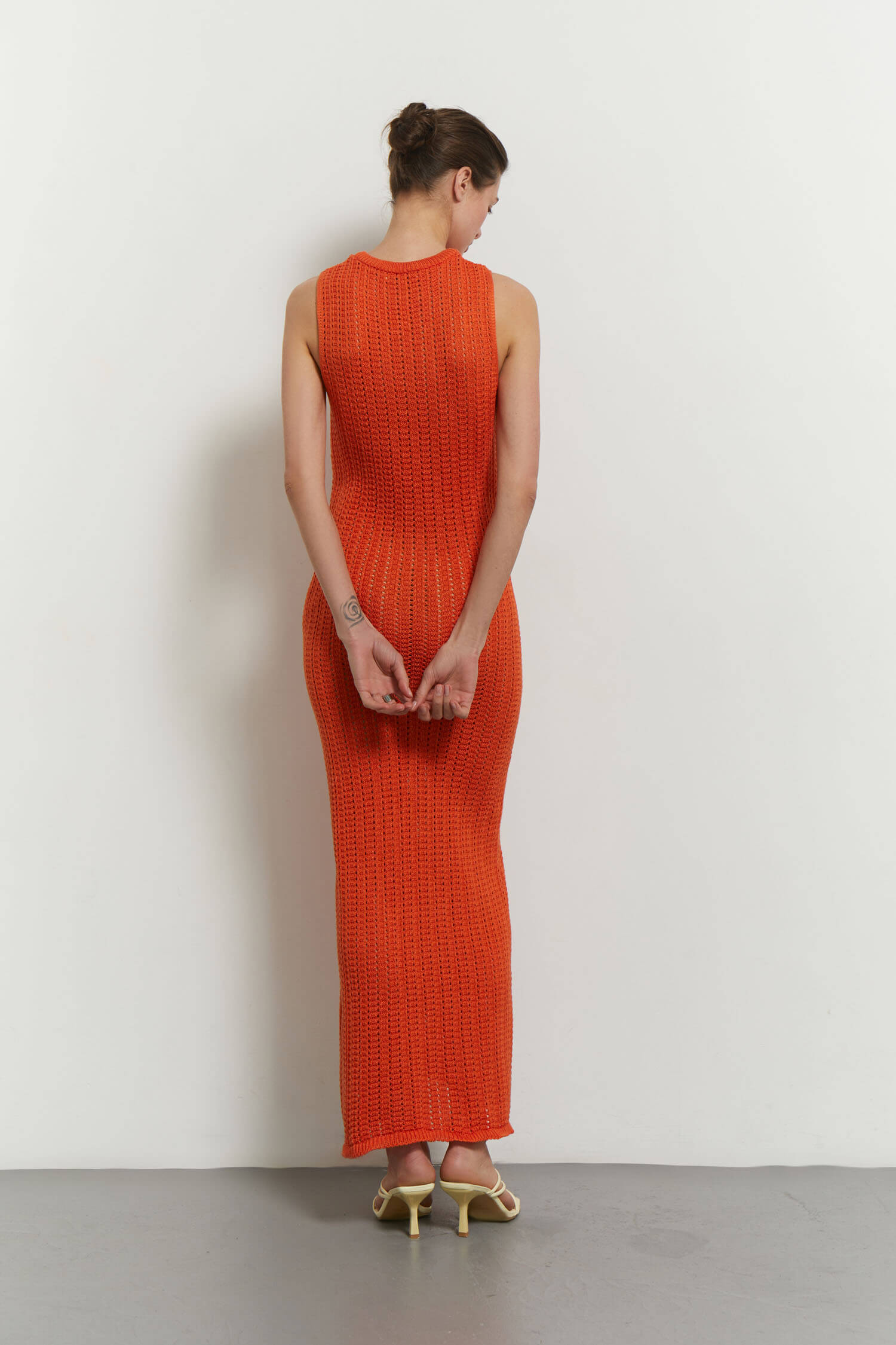 Knitted maxi dress in orange/green