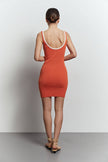 Knitted mini dress with edging in orange/black