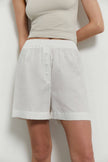 Oversized linen shorts with buttons