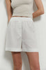 Oversized linen shorts with buttons