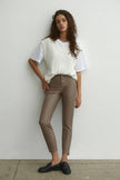 Faux leather pants in cream